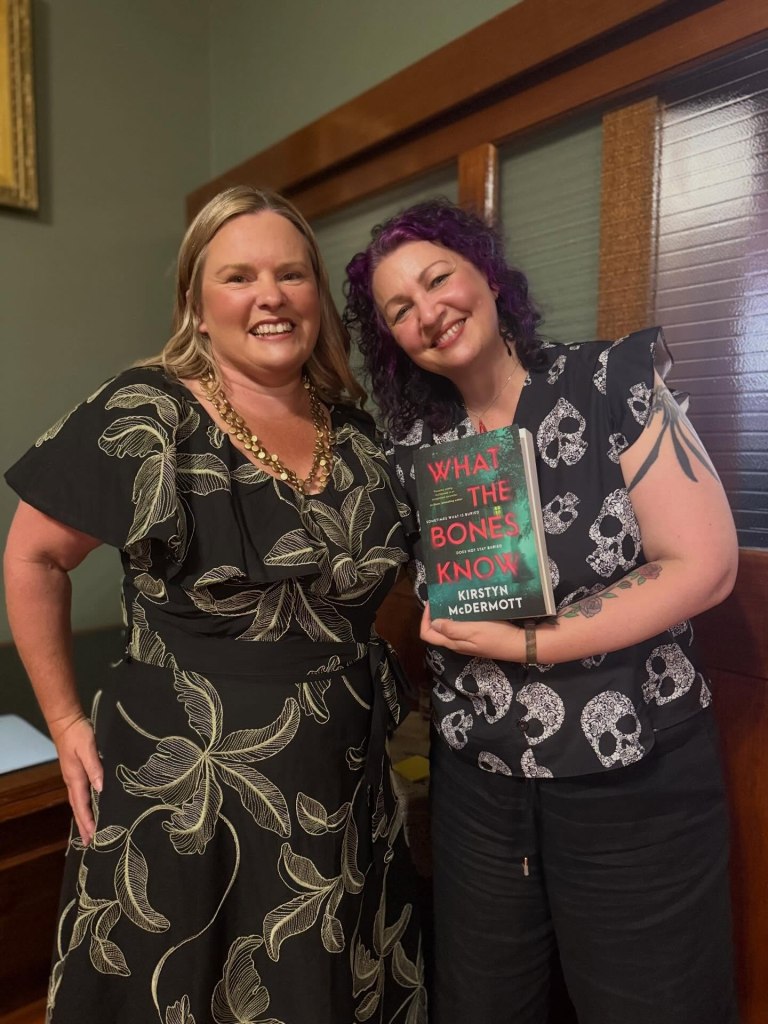 Renee from the Collins Booksellers team with Kirstyn McDermott, who is holding a copy of her novel and wearing a very happy grin.
Photo by Collins Booksellers