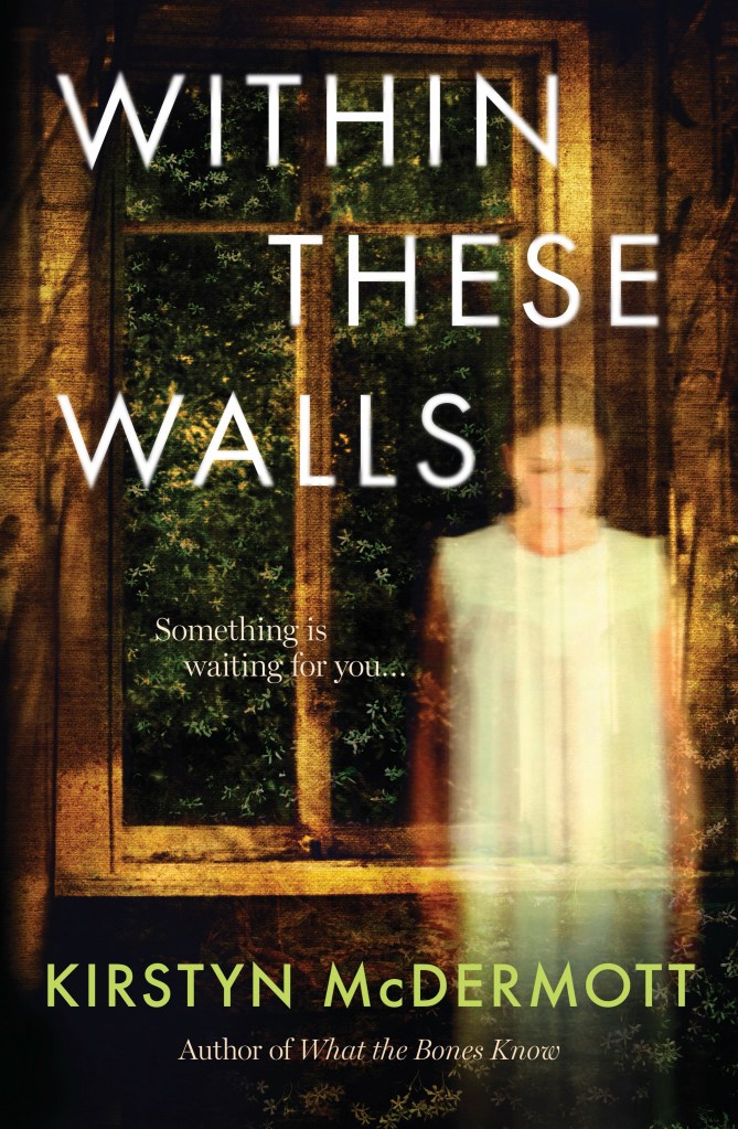 Cover of Within These Walls by Kirstyn McDermott. A night-time scene showing a lamp-lit window outside of which jasmine vines press against the glass. In the foreground, a semi-transparent woman stands with head bowed, ghostly in her white nightgown.